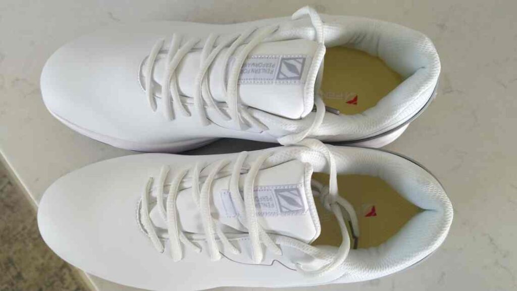 Elegant white golf shoes with great non-slip soles and lace-up closure.