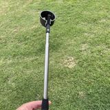 Lightweight golf ball retriever with grip.