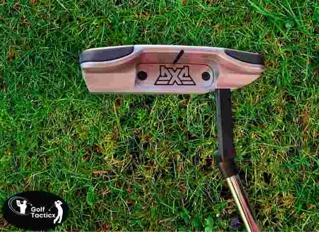 Blade-style putter head close-up.